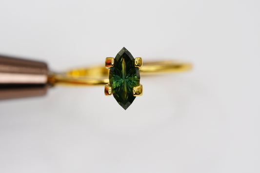 0.78 Carat Fantasy Cut Natural Dark Teal Sapphire