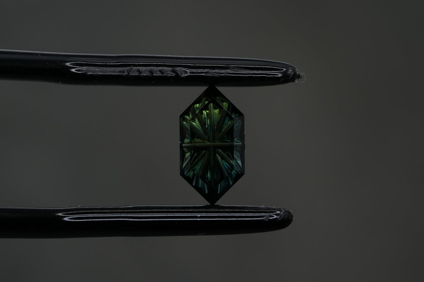 0.95 Carat Fantasy Cut Natural Dark Parti Sapphire