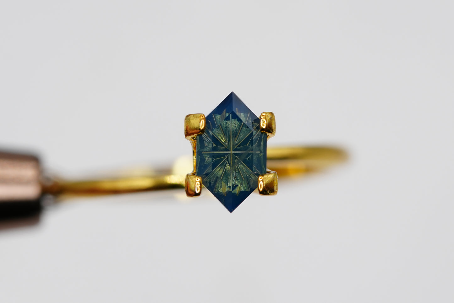 0.73 Carat Fantasy Cut Natural Opalescent Teal Sapphire