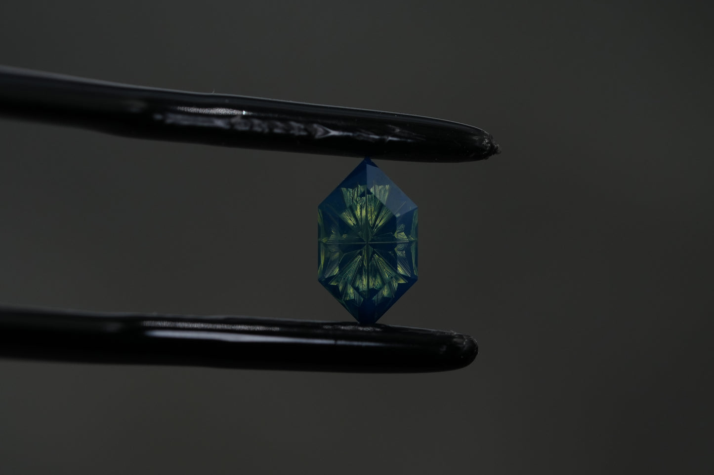 0.73 Carat Fantasy Cut Natural Opalescent Teal Sapphire