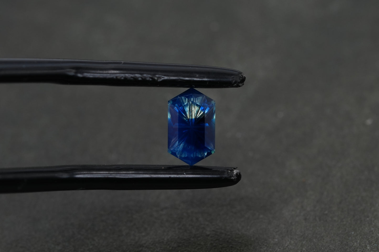 0.6 Carat Fantasy Cut Milky Parti Dark Blue/Yellow Natural Sapphire